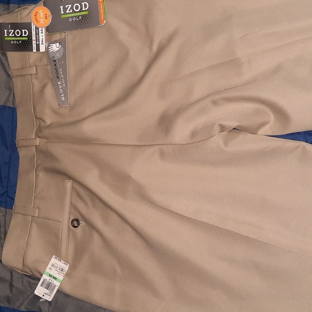 Men's Izod golf / casual pants. Waist 34 length 32. Brand new- 1-khaki, 1-black